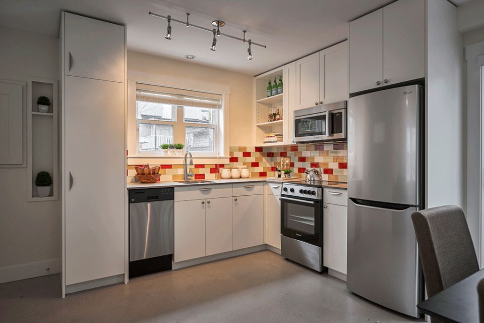 Traditional in style, this new laneway house fits in with its neighbors. It has 2 bedrooms in 670 sq ft. | www.facebook.com/SmallHouseBliss