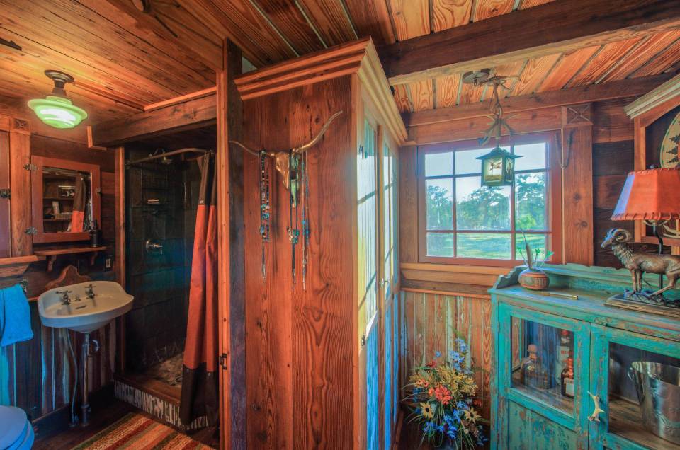 The rustic Cowboy Cabin was built from salvaged materials. The 12'x28' cabin has 2 sleeping lofts. | www.facebook.com/SmallHouseBliss