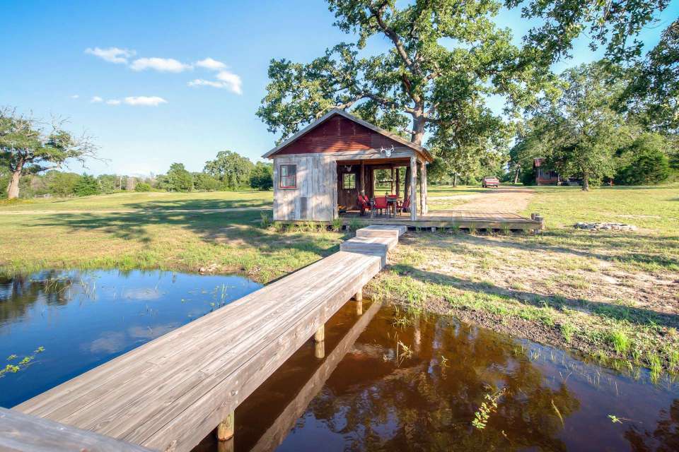 The rustic Cowboy Cabin was built from salvaged materials. The 12'x28' cabin has 2 sleeping lofts. | www.facebook.com/SmallHouseBliss