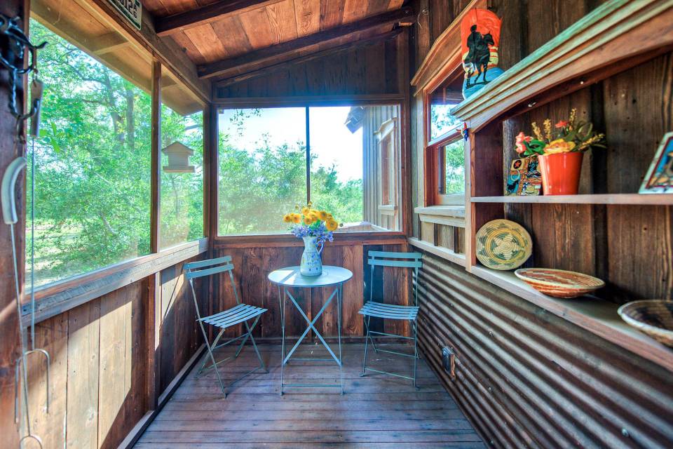 The rustic Cowboy Cabin was built from salvaged materials. The 12'x28' cabin has 2 sleeping lofts. | www.facebook.com/SmallHouseBliss