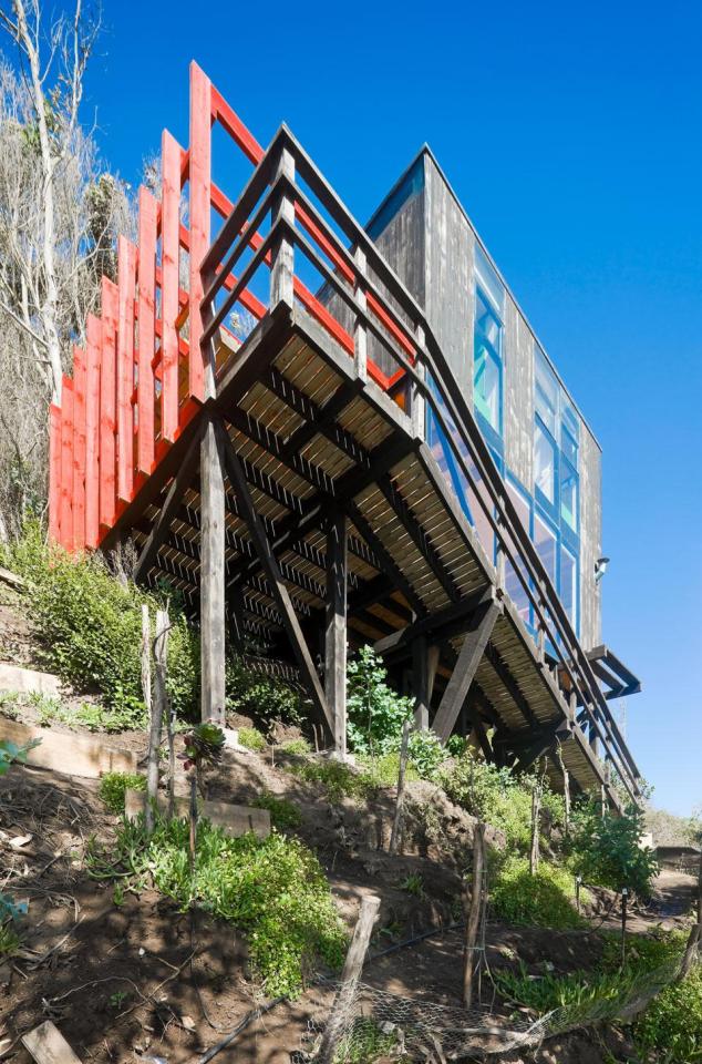 A low-cost "surf shack" cabin overlooking the ocean in Chile. Shared by two brothers, it has two small bedrooms in 555 sq ft. | www.facebook.com/SmallHouseBliss