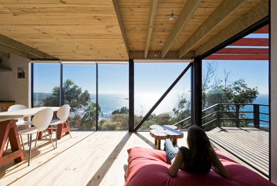 A low-cost "surf shack" cabin overlooking the ocean in Chile. Shared by two brothers, it has two small bedrooms in 555 sq ft. | www.facebook.com/SmallHouseBliss