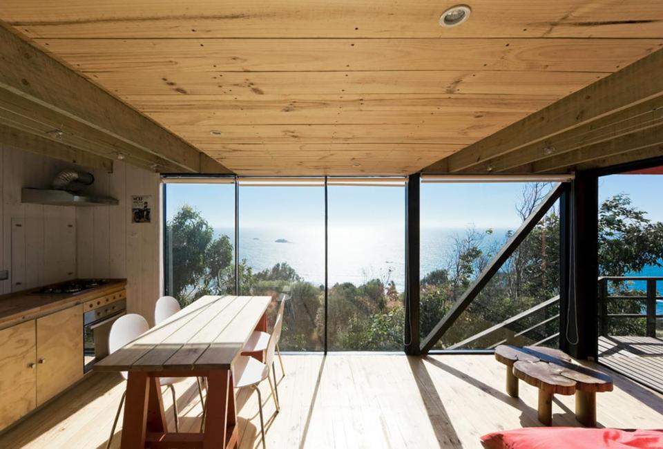 A low-cost "surf shack" cabin overlooking the ocean in Chile. Shared by two brothers, it has two small bedrooms in 555 sq ft. | www.facebook.com/SmallHouseBliss