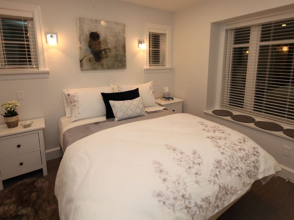 Buttercup Guest House, a 780 sq ft backyard cottage with a bedroom and bathroom on both floors. | www.facebook.com/SmallHouseBliss