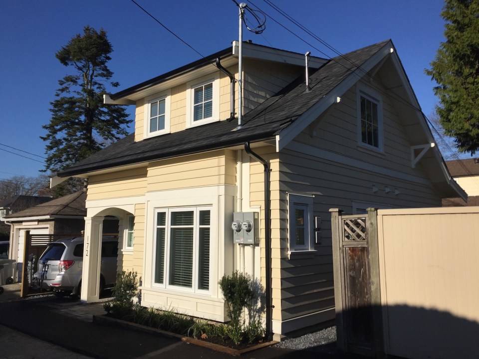 Buttercup Guest House, a 780 sq ft backyard cottage with a bedroom and bathroom on both floors. | www.facebook.com/SmallHouseBliss