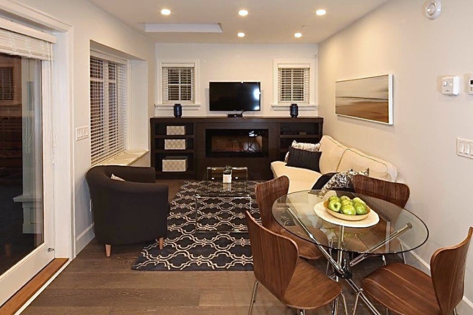 Buttercup Guest House, a 780 sq ft backyard cottage with a bedroom and bathroom on both floors. | www.facebook.com/SmallHouseBliss