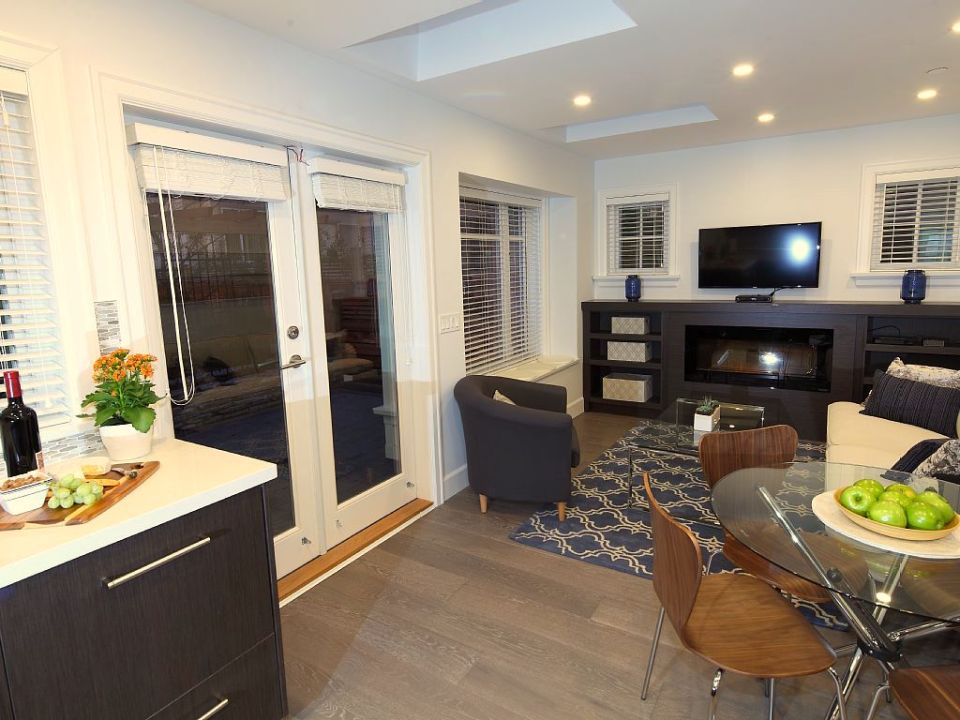 Buttercup Guest House, a 780 sq ft backyard cottage with a bedroom and bathroom on both floors. | www.facebook.com/SmallHouseBliss