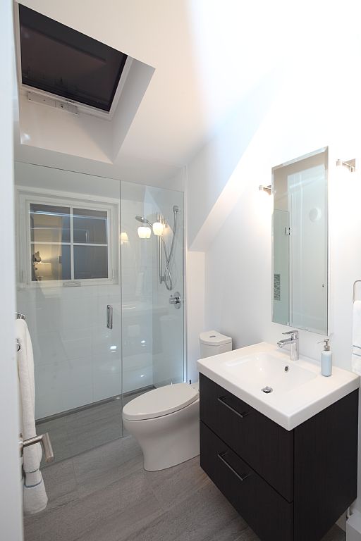 Buttercup Guest House, a 780 sq ft backyard cottage with a bedroom and bathroom on both floors. | www.facebook.com/SmallHouseBliss