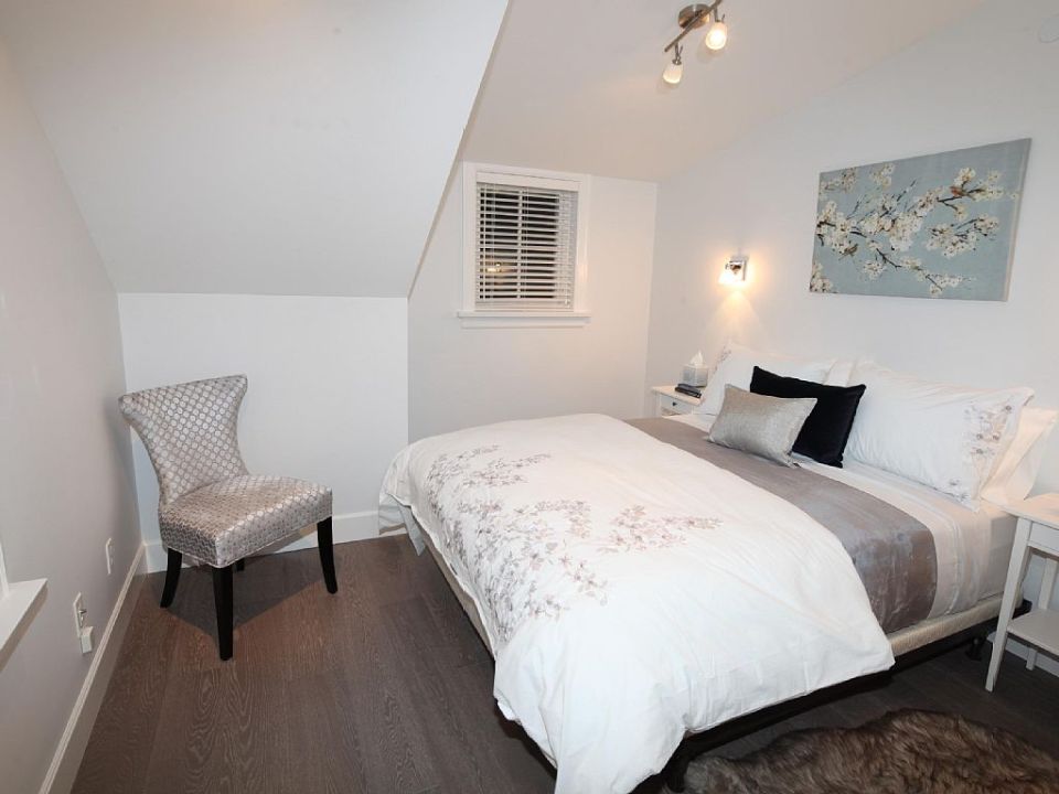 Buttercup Guest House, a 780 sq ft backyard cottage with a bedroom and bathroom on both floors. | www.facebook.com/SmallHouseBliss