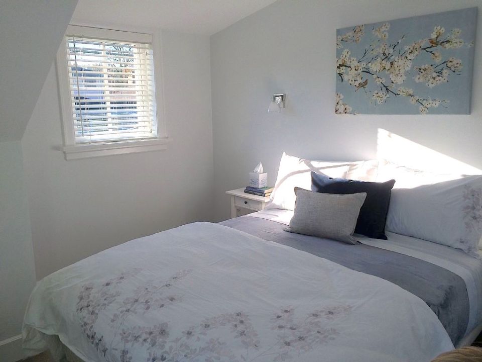 Buttercup Guest House, a 780 sq ft backyard cottage with a bedroom and bathroom on both floors. | www.facebook.com/SmallHouseBliss