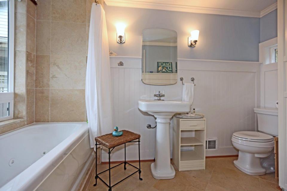 This breezy beach cottage was renovated from an old-timer fishing cabin. It has a 336 sq ft studio floor plan. | www.facebook.com/SmallHouseBliss