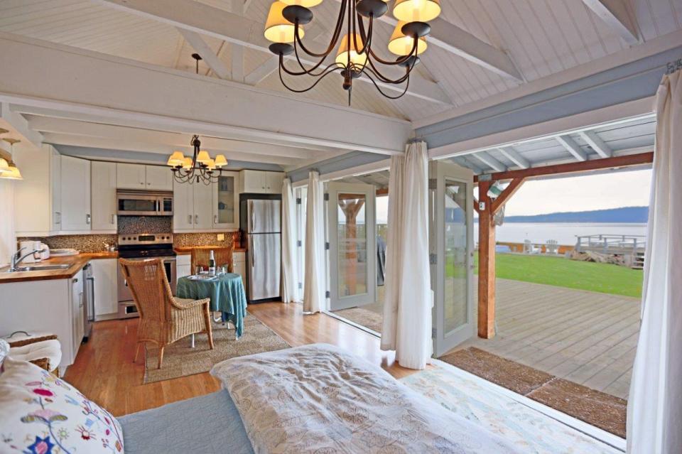 This breezy beach cottage was renovated from an old-timer fishing cabin. It has a 336 sq ft studio floor plan. | www.facebook.com/SmallHouseBliss