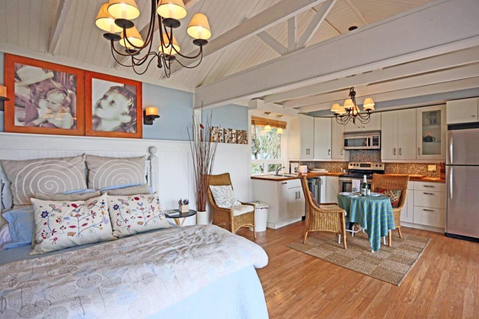 This breezy beach cottage was renovated from an old-timer fishing cabin. It has a 336 sq ft studio floor plan. | www.facebook.com/SmallHouseBliss