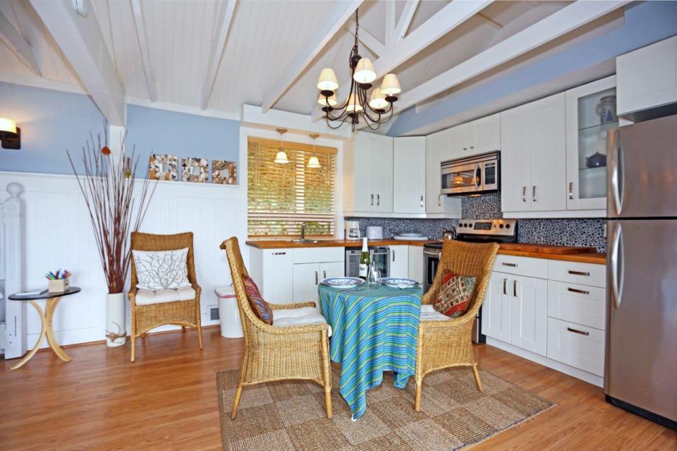 This breezy beach cottage was renovated from an old-timer fishing cabin. It has a 336 sq ft studio floor plan. | www.facebook.com/SmallHouseBliss
