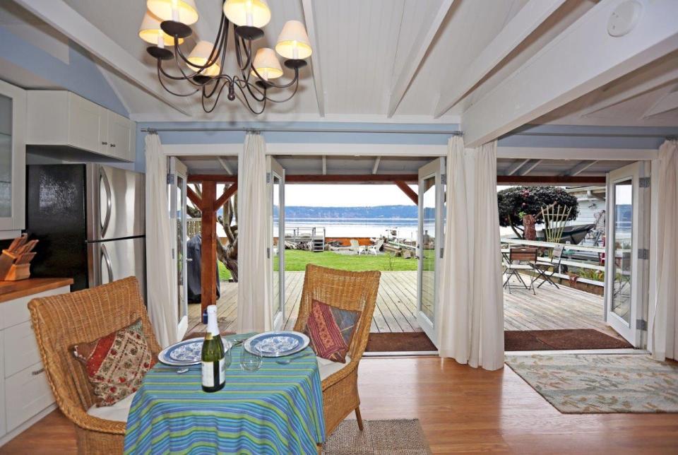 This breezy beach cottage was renovated from an old-timer fishing cabin. It has a 336 sq ft studio floor plan. | www.facebook.com/SmallHouseBliss