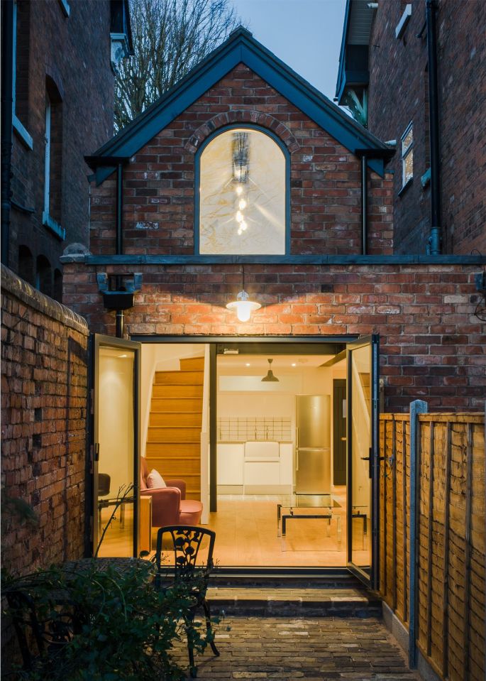 This Victorian-era brick coach house was converted into an inspiring home and studio for a writer. | www.facebook.com/SmallHouseBliss