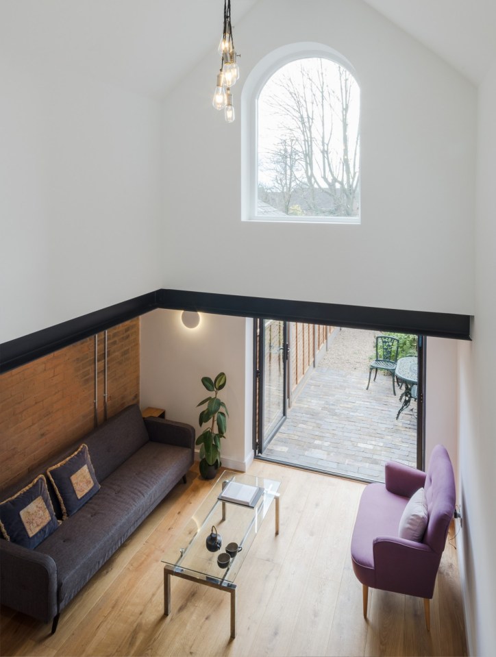 This Victorian-era brick coach house was converted into an inspiring home and studio for a writer. | www.facebook.com/SmallHouseBliss