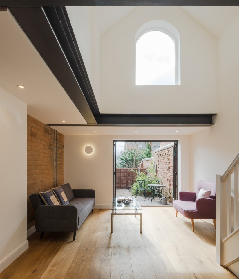 This Victorian-era brick coach house was converted into an inspiring home and studio for a writer. | www.facebook.com/SmallHouseBliss