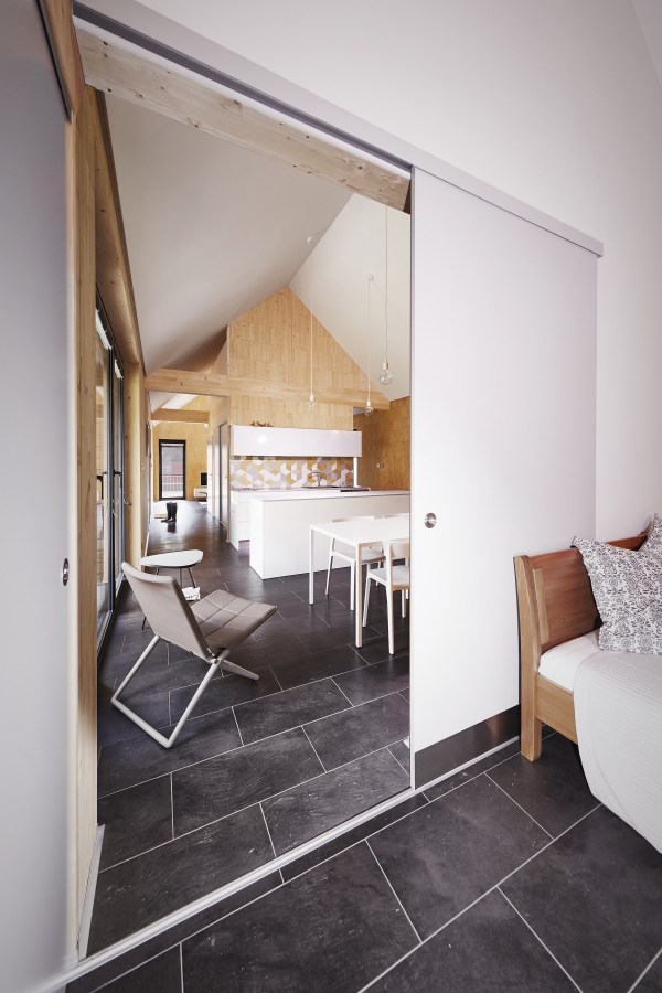 The Wooden Brick House adds contemporary detailing to the local village house architecture. It has 745 sq ft inside with one bedroom. | www.facebook.com/SmallHouseBliss