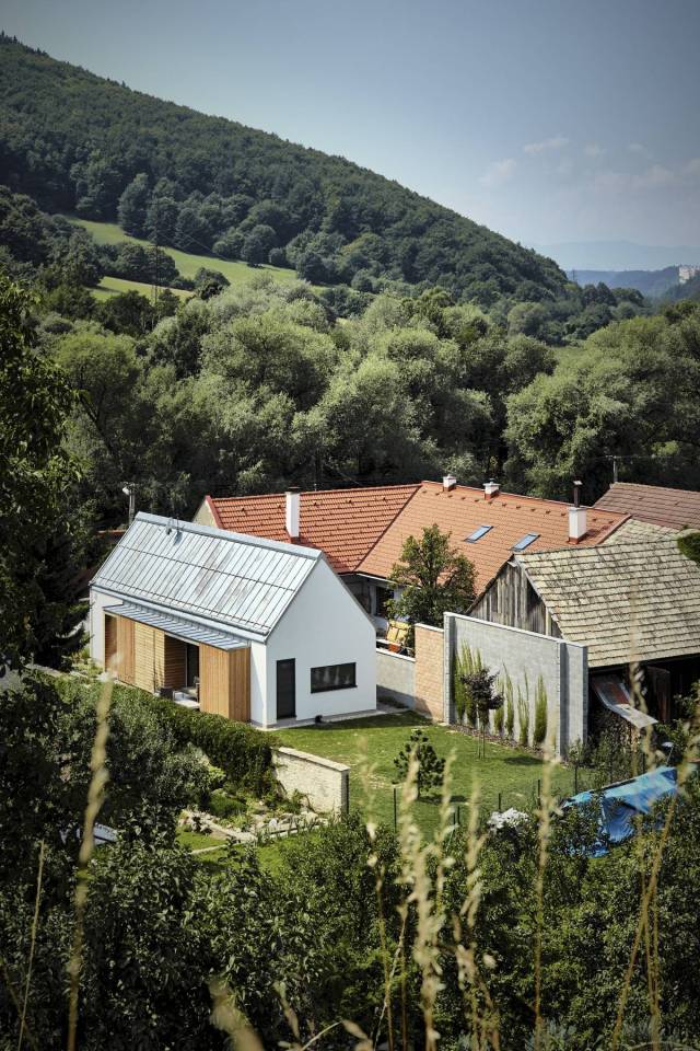 The Wooden Brick House adds contemporary detailing to the local village house architecture. It has 745 sq ft inside with one bedroom. | www.facebook.com/SmallHouseBliss
