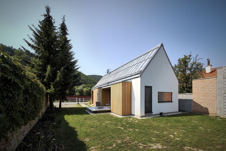 The Wooden Brick House adds contemporary detailing to the local village house architecture. It has 745 sq ft inside with one bedroom. | www.facebook.com/SmallHouseBliss