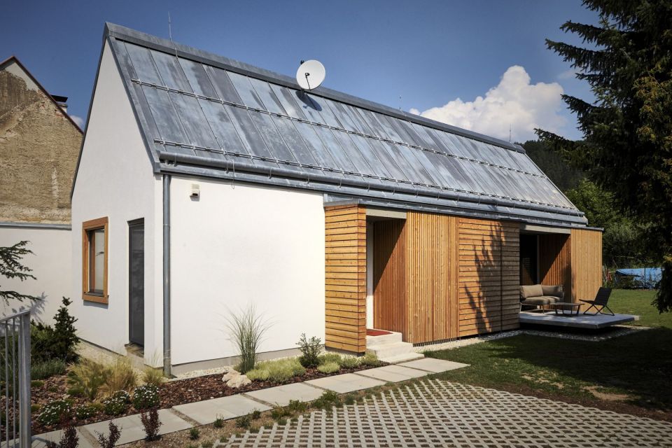 The Wooden Brick House adds contemporary detailing to the local village house architecture. It has 745 sq ft inside with one bedroom. | www.facebook.com/SmallHouseBliss