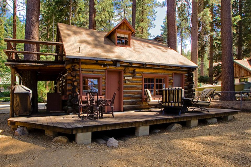 This saddle-notched log cabin was built in 1929 on Lake Tahoe. It has a 475 sq ft footprint plus a loft bedroom. | www.facebook.com/SmallHouseBliss