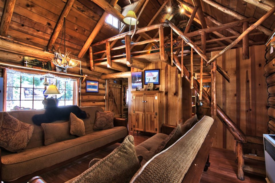 This saddle-notched log cabin was built in 1929 on Lake Tahoe. It has a 475 sq ft footprint plus a loft bedroom. | www.facebook.com/SmallHouseBliss
