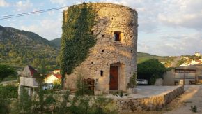 The ruins of a stone windmill, built in 1761, were restored and turned into this small tower residence. | www.facebook.com/SmallHouseBliss