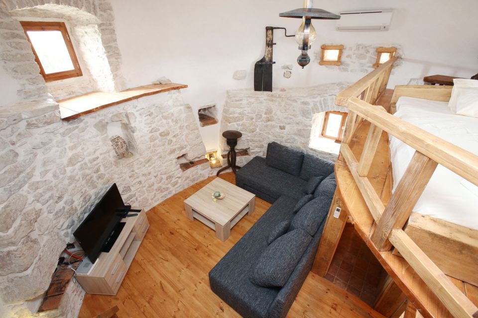 The ruins of a stone windmill, built in 1761, were restored and turned into this small tower residence. | www.facebook.com/SmallHouseBliss