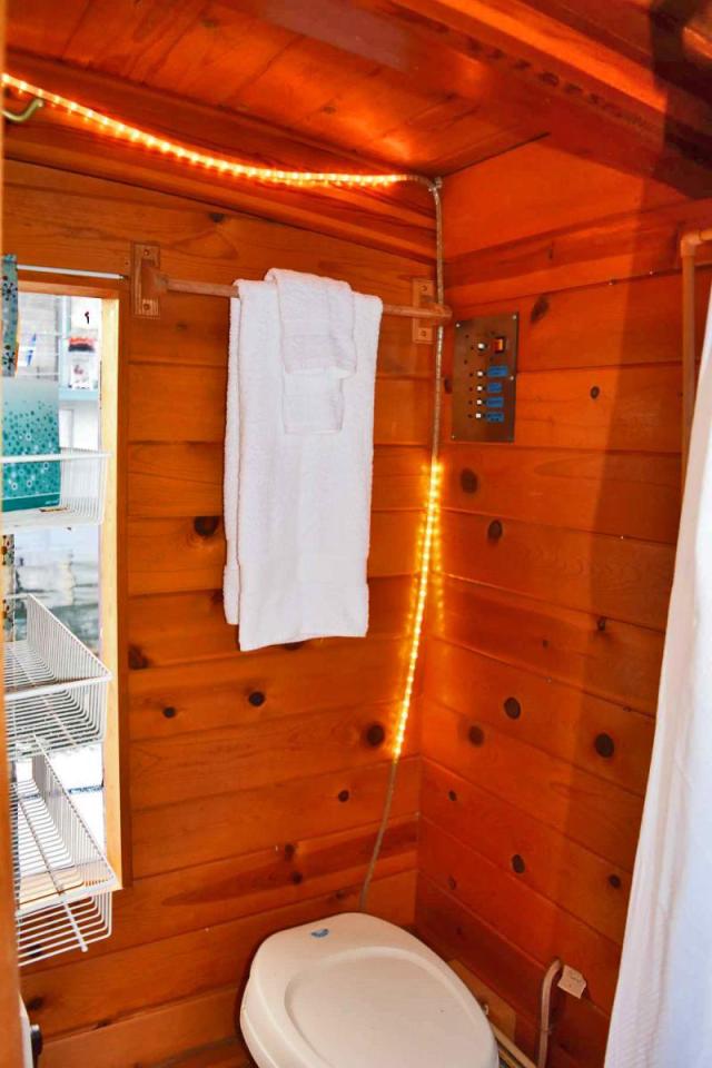 "Tao", a tiny houseboat on Seattle's Lake Union. Tao has roughly 260 sq ft of inside space plus a sleeping loft. | www.facebook.com/SmallHouseBliss