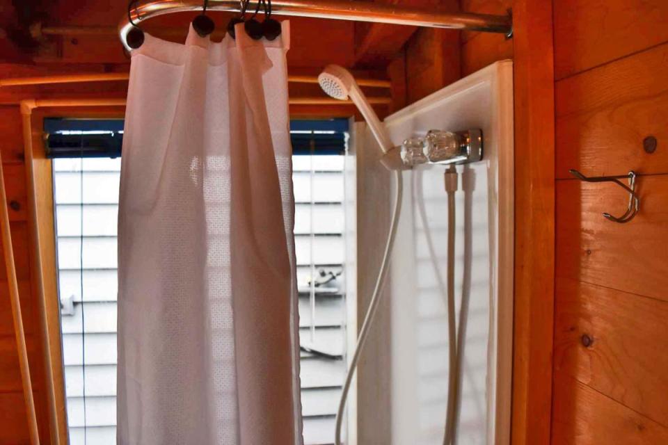 "Tao", a tiny houseboat on Seattle's Lake Union. Tao has roughly 260 sq ft of inside space plus a sleeping loft. | www.facebook.com/SmallHouseBliss