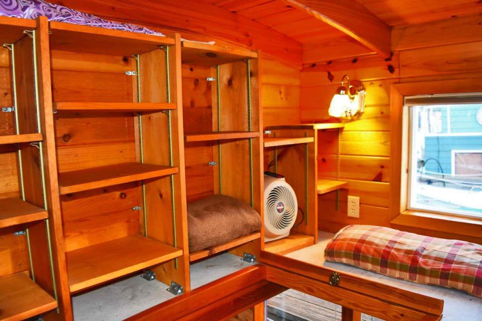 "Tao", a tiny houseboat on Seattle's Lake Union. Tao has roughly 260 sq ft of inside space plus a sleeping loft. | www.facebook.com/SmallHouseBliss