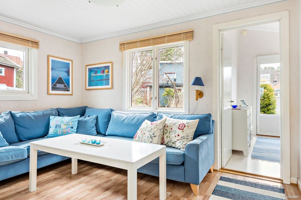 This cozy 1930 cottage is located in a small town on Sweden's coast. It has two bedrooms in 506 sq ft. | www.facebook.com/SmallHouseBliss