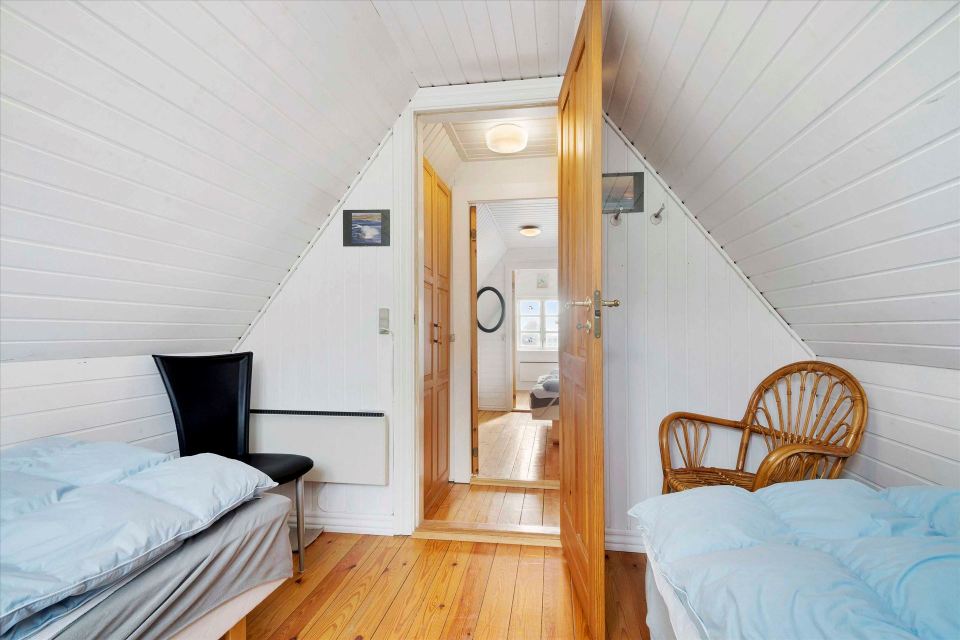 This 80-year-old thatched cottage in Denmark sits in the coastal dunes by the North Sea. It has two bedrooms in 753 sq ft. | www.facebook.com/SmallHouseBliss
