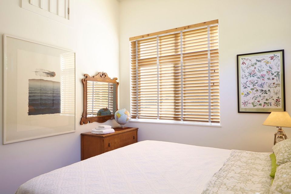 Many cost-saving strategies were used in the design and construction of this small beach cottage in California. | www.facebook.com/SmallHouseBliss