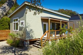 Many cost-saving strategies were used in the design and construction of this small beach cottage in California. | www.facebook.com/SmallHouseBliss