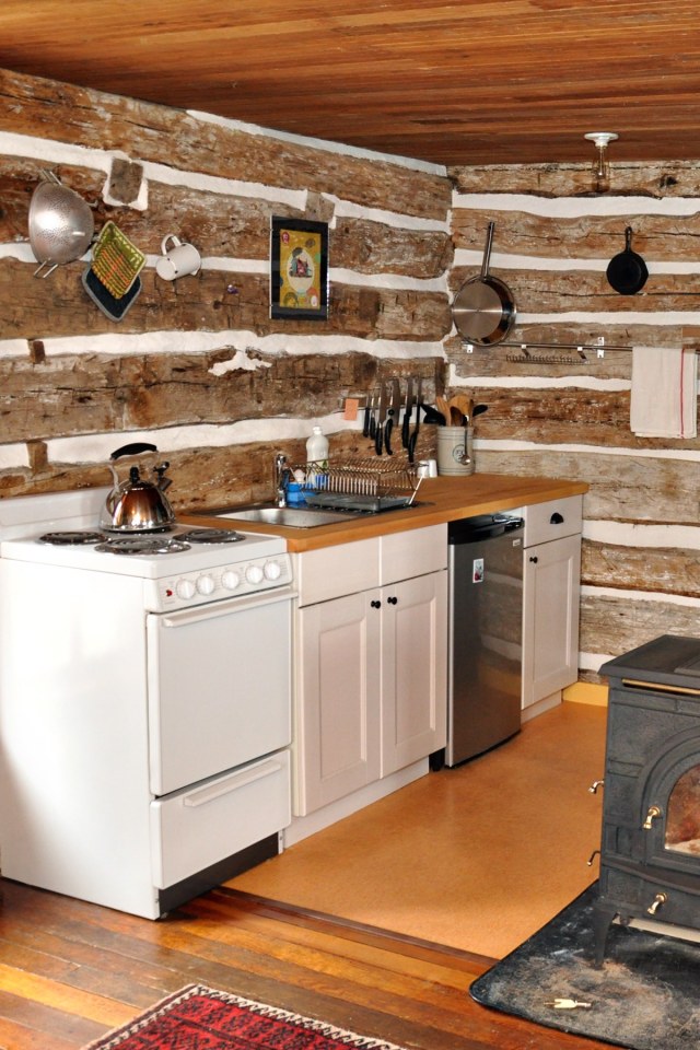 Trout River Log Cabin is over 150 years old. Originally a school, it has twice been disassembled, moved and put back together. | www.facebook.com/SmallHouseBliss