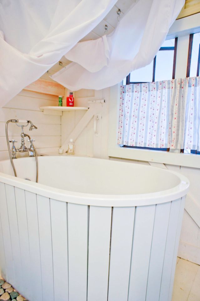 A 100-year-old barn converted into a small house with one bedroom in 650 sq ft. | www.facebook.com/SmallHouseBliss