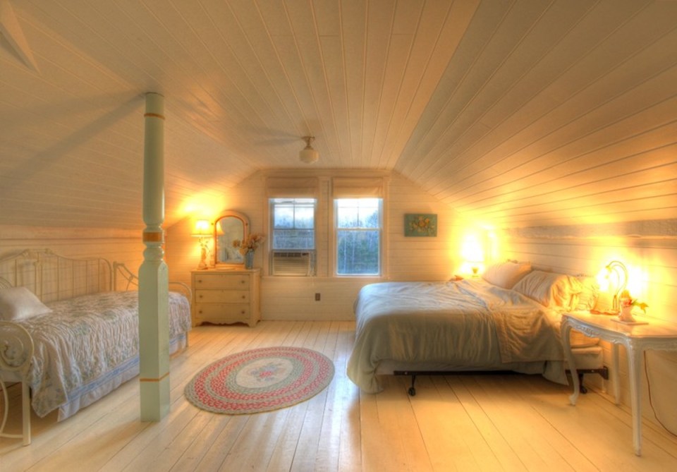 A 100-year-old barn converted into a small house with one bedroom in 650 sq ft. | www.facebook.com/SmallHouseBliss