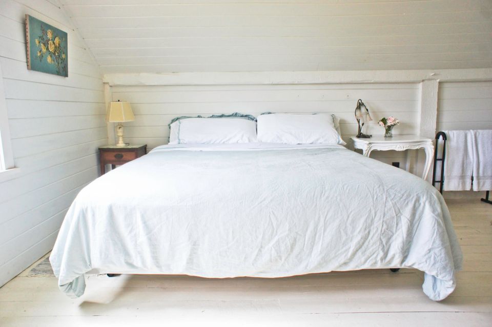 A 100-year-old barn converted into a small house with one bedroom in 650 sq ft. | www.facebook.com/SmallHouseBliss