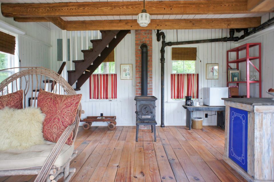 A 100-year-old barn converted into a small house with one bedroom in 650 sq ft. | www.facebook.com/SmallHouseBliss