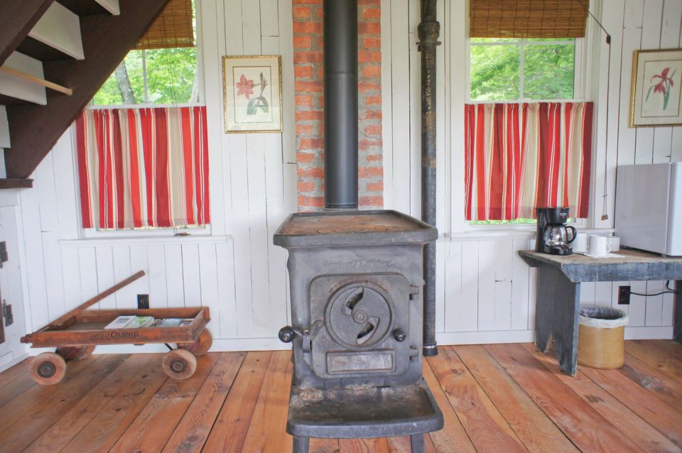 A 100-year-old barn converted into a small house with one bedroom in 650 sq ft. | www.facebook.com/SmallHouseBliss