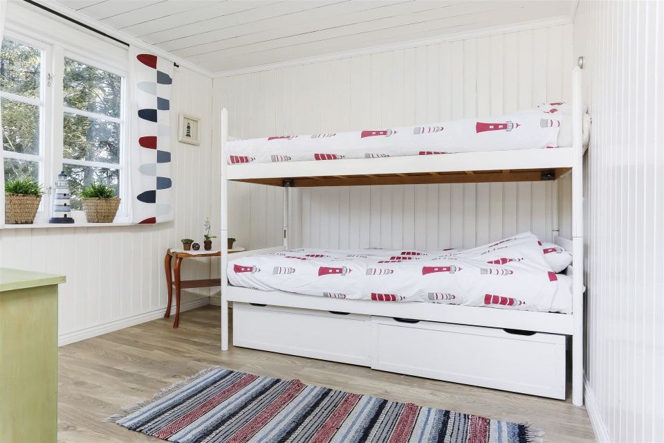 This 1930 summer cottage in Sweden retains its original vintage charm. It has two small bedrooms in 592 sq ft. | www.facebook.com/SmallHouseBliss