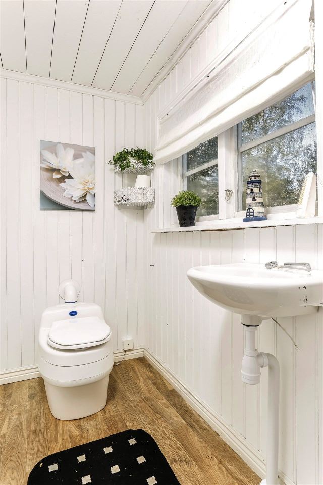 This 1930 summer cottage in Sweden retains its original vintage charm. It has two small bedrooms in 592 sq ft. | www.facebook.com/SmallHouseBliss