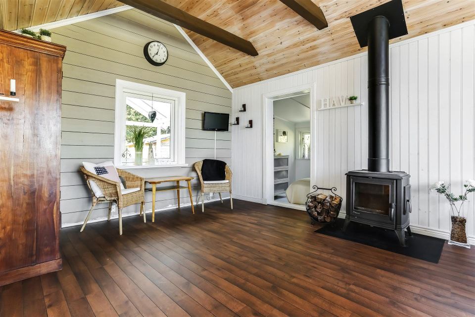 This 1930 summer cottage in Sweden retains its original vintage charm. It has two small bedrooms in 592 sq ft. | www.facebook.com/SmallHouseBliss