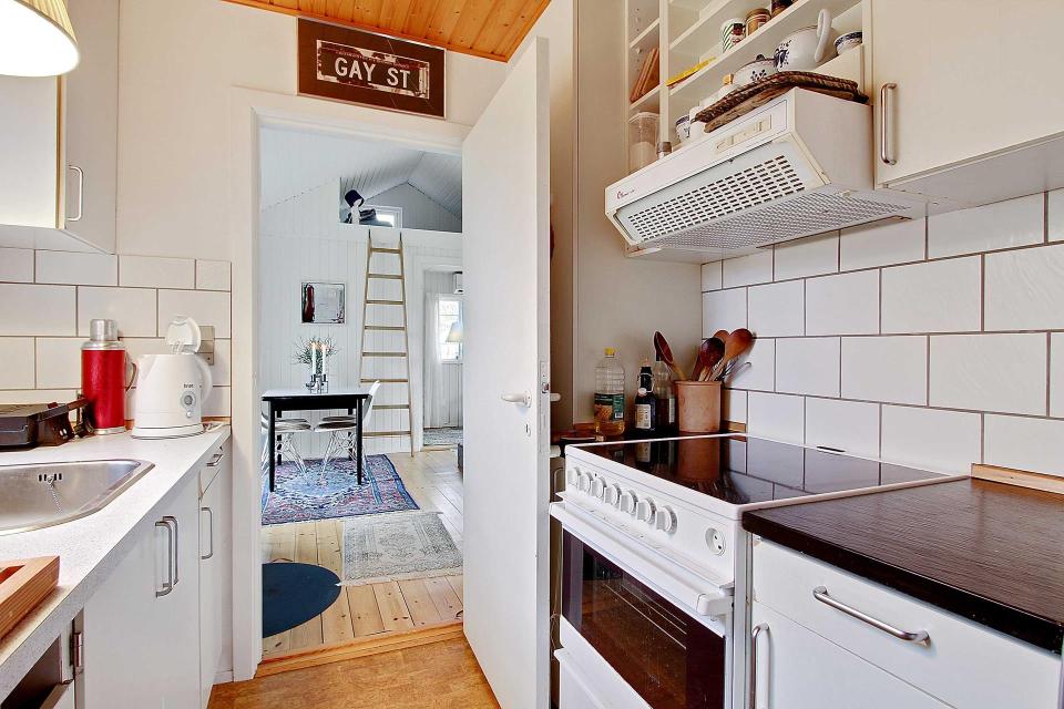 Summerhouse in Denmark with 463 sq ft of inside space. It has two small bedrooms plus a sleeping loft. | www.facebook.com/SmallHouseBliss