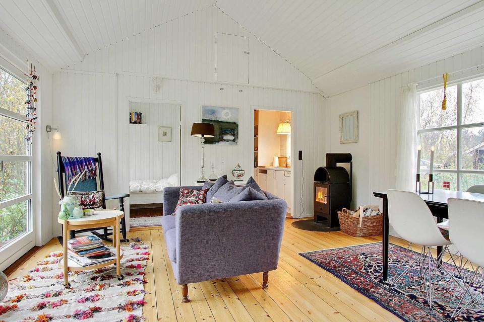 Summerhouse in Denmark with 463 sq ft of inside space. It has two small bedrooms plus a sleeping loft. | www.facebook.com/SmallHouseBliss