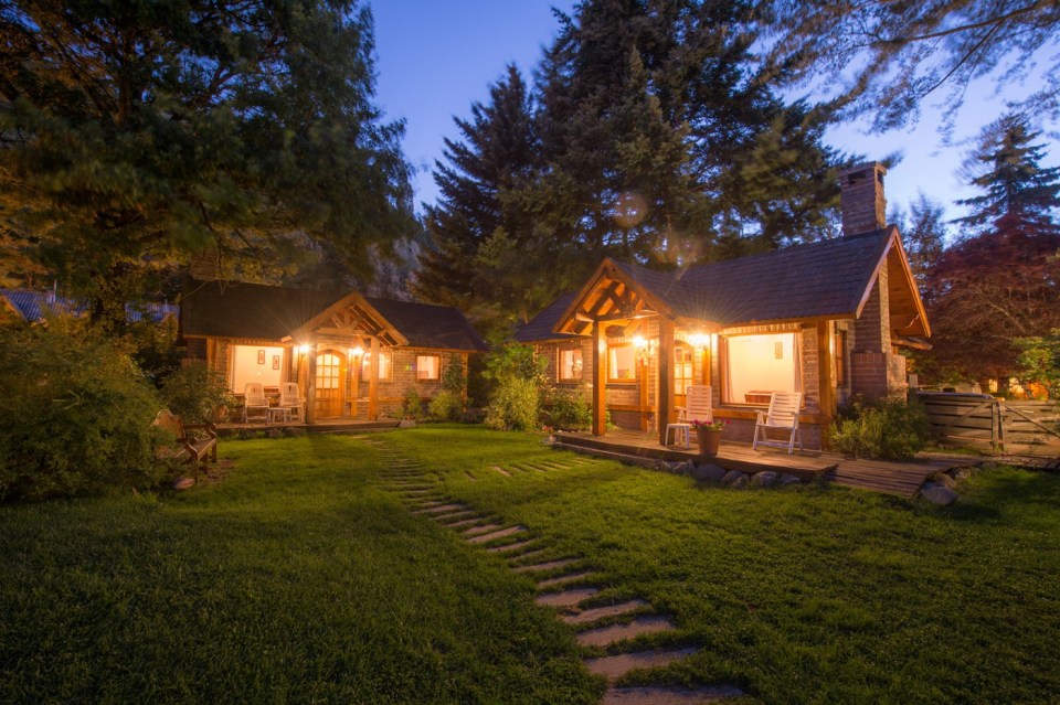 These Alpine-style brick and wood cottages in Patagonia offer one bedroom in a 786 sq ft single-level plan. | www.facebook.com/SmallHouseBliss