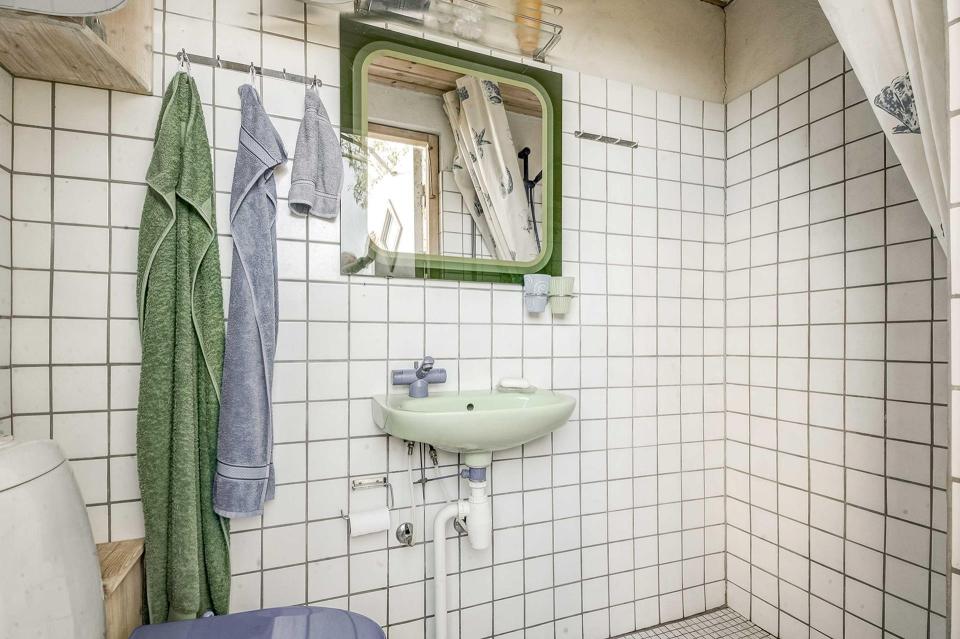 This tiny beachfront cottage in Denmark has 172 sq ft on the ground floor plus a sleeping loft. | www.facebook.com/SmallHouseBliss